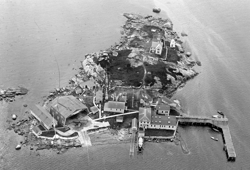 Aerial view of the amphibian airbase at Ten Pound Island, Gloucester Harbor, after several years in service. (U.S. Coast Guard) Aerial view of the amphibian airbase at Ten Pound Island, Gloucester Harbor, after several years in service. (U.S. Coast Guard)